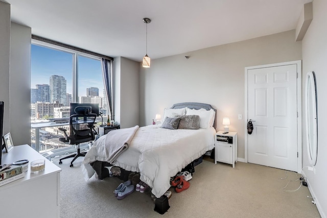757 N Orleans St Unit 909, Chicago, IL 60654 - bedroom featuring light carpet and a desk