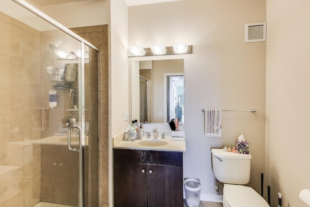 757 N Orleans St Unit 909, Chicago, IL 60654 - bathroom with toilet, vanity, and a shower stall