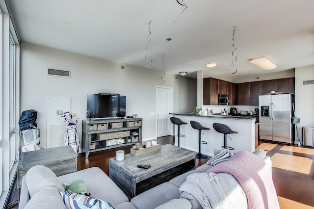 757 N Orleans St Unit 909, Chicago, IL 60654 - living room featuring light wood-style flooring