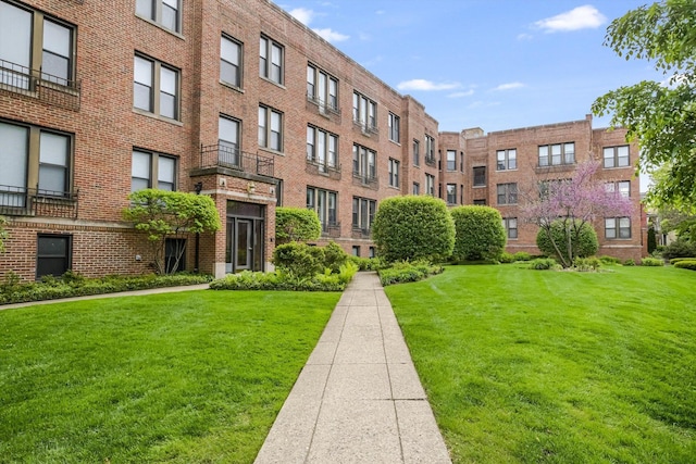 626 Judson Ave Unit 3, Evanston, IL 60202 - view of community featuring a lawn