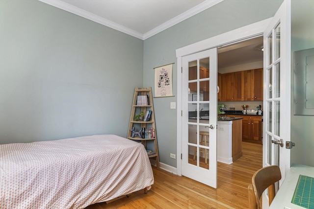 626 Judson Ave Unit 3, Evanston, IL 60202 - bedroom featuring french doors, ornamental molding, light wood-type flooring, baseboards, and electric panel