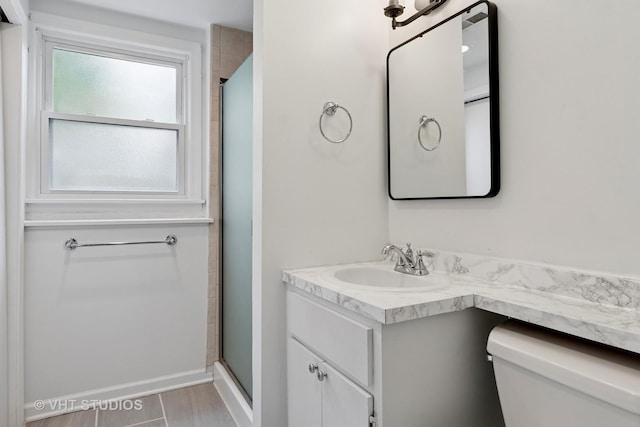 212 E 11th Ave, Naperville, IL 60563 - full bathroom with toilet, vanity, and a shower stall