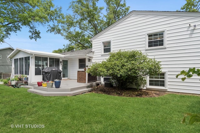 212 E 11th Ave, Naperville, IL 60563 - back of house featuring a sunroom, a deck, and a yard