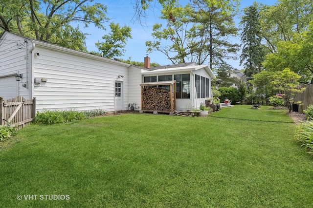 212 E 11th Ave, Naperville, IL 60563 - back of property featuring a sunroom and a chimney