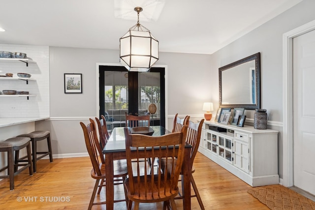 212 E 11th Ave, Naperville, IL 60563 - dining area with light wood finished floors and baseboards