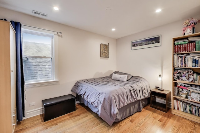 5319 W Cullom Ave, Chicago, IL 60641 - bedroom featuring light wood-style floors and recessed lighting