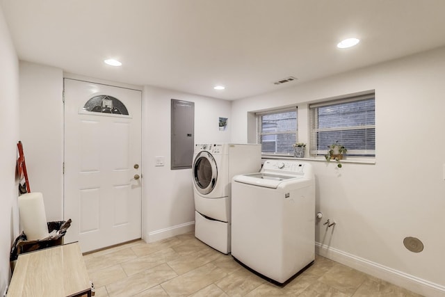 5319 W Cullom Ave, Chicago, IL 60641 - laundry area with electric panel, washer and clothes dryer, baseboards, and recessed lighting