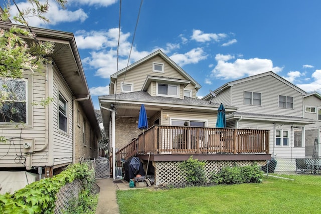 5319 W Cullom Ave, Chicago, IL 60641 - back of property featuring a deck, a gate, and a shingled roof