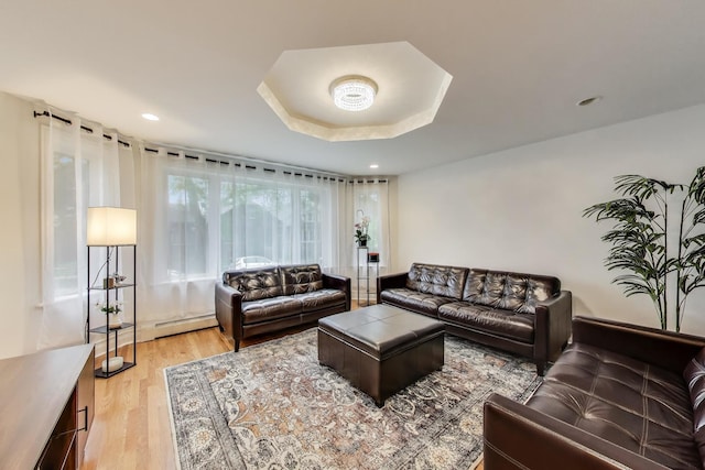 5319 W Cullom Ave, Chicago, IL 60641 - living room with a baseboard radiator, light wood-type flooring, and recessed lighting