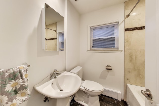 5319 W Cullom Ave, Chicago, IL 60641 - bathroom with a baseboard radiator, baseboards, toilet, washtub / shower combination, and a sink