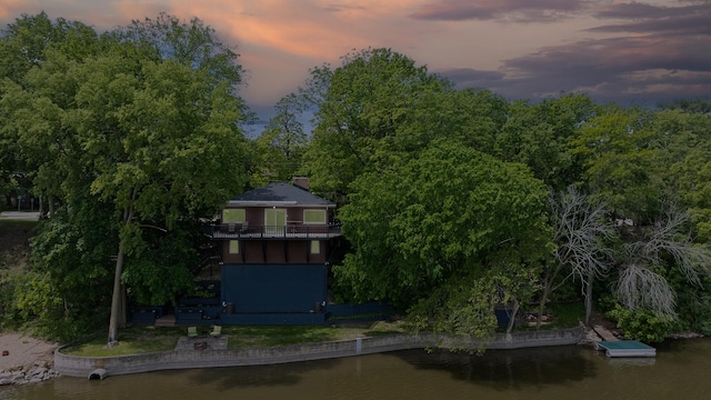 605 N 4th St, Oregon, IL 61061 - back of property featuring a water view, a balcony, and a chimney