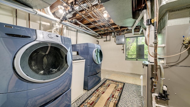 605 N 4th St, Oregon, IL 61061 - washroom with washing machine and clothes dryer and heating unit