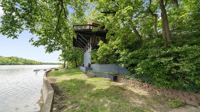 605 N 4th St, Oregon, IL 61061 - view of yard featuring a deck with water view