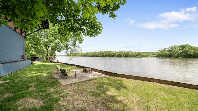 605 N 4th St, Oregon, IL 61061 - dock area featuring a water view and a lawn