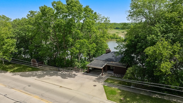 605 N 4th St, Oregon, IL 61061 - aerial view of a tree filled landscape and a nearby body of water