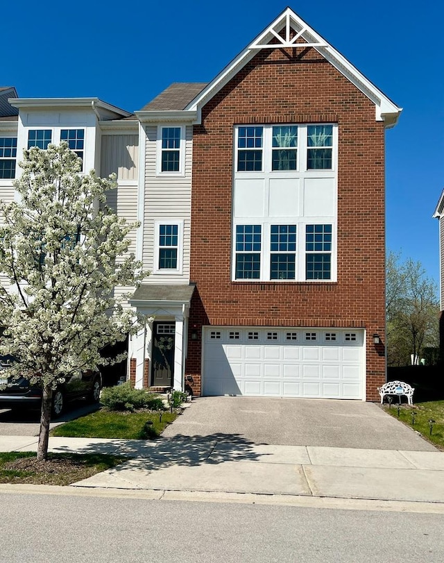 790 Weller Dr, Des Plaines, IL 60016 - view of front of home featuring a garage, concrete driveway, and brick siding