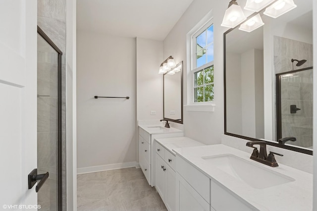 790 Weller Dr, Des Plaines, IL 60016 - bathroom featuring a stall shower, marble look tiles, and two vanities