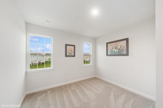 790 Weller Dr, Des Plaines, IL 60016 - empty room featuring baseboards and light carpet