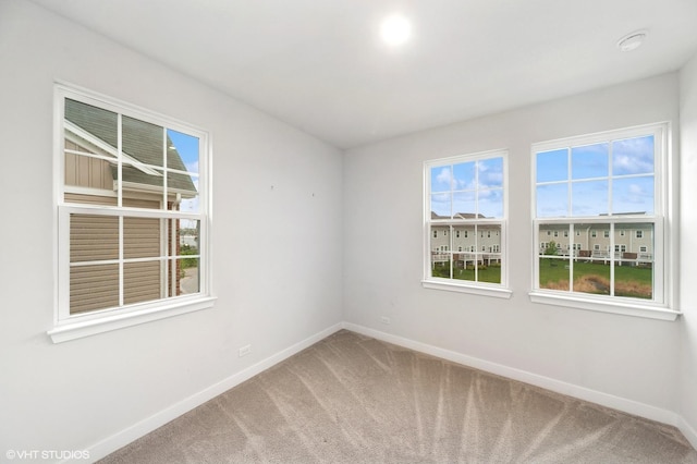 790 Weller Dr, Des Plaines, IL 60016 - spare room with baseboards, carpet floors, and healthy amount of natural light