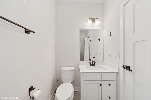 790 Weller Dr, Des Plaines, IL 60016 - bathroom with toilet, vanity, and baseboards