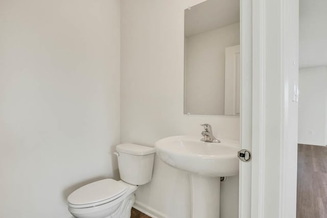 1554 Sequoia Way, Pingree Grove, IL 60140 - bathroom with toilet, wood finished floors, baseboards, and a sink