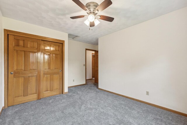 307 Shelden Dr, Winnebago, IL 61088 - unfurnished bedroom featuring carpet floors, baseboards, and a ceiling fan