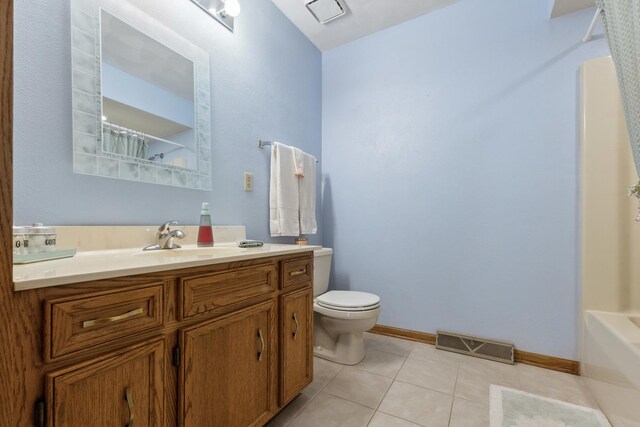 307 Shelden Dr, Winnebago, IL 61088 - bathroom featuring vanity, toilet, tile patterned flooring, curtained shower, and baseboards