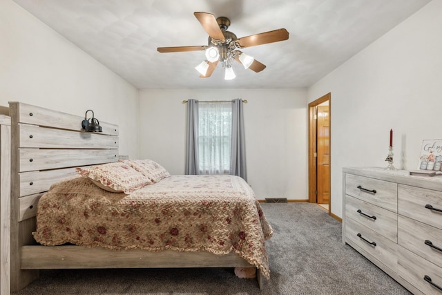 307 Shelden Dr, Winnebago, IL 61088 - carpeted bedroom featuring baseboards and a ceiling fan