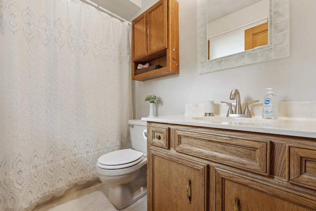307 Shelden Dr, Winnebago, IL 61088 - bathroom featuring toilet, vanity, curtained shower, and tile patterned floors