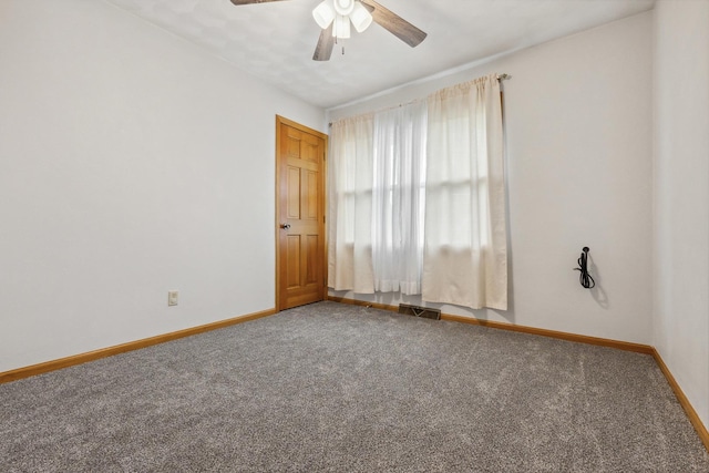307 Shelden Dr, Winnebago, IL 61088 - carpeted empty room featuring baseboards and a ceiling fan