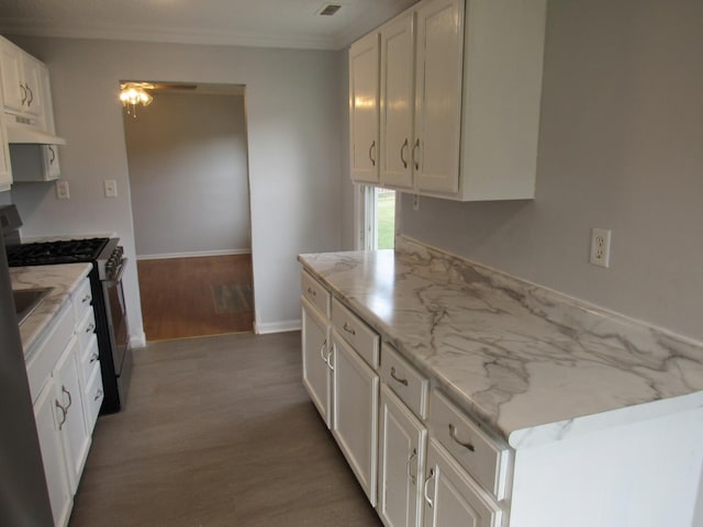 1503 Cherokee Dr, Round Lake Beach, IL 60073 - kitchen featuring light wood-style flooring, stainless steel range with gas stovetop, under cabinet range hood, white cabinetry, and crown molding