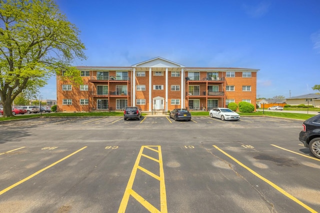 6135 W 94th St Unit C2, Oak Lawn, IL 60453 - view of apartment building / complex featuring uncovered parking