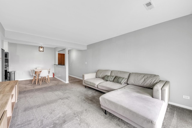 6135 W 94th St Unit C2, Oak Lawn, IL 60453 - carpeted living room with baseboards