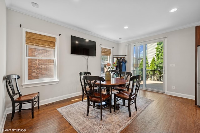 4218 N California Ave, Chicago, IL 60618 - dining room with wood finished floors, ornamental molding, baseboards, and recessed lighting