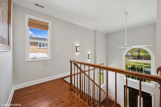 4218 N California Ave, Chicago, IL 60618 - hall with an upstairs landing, crown molding, wood finished floors, and baseboards