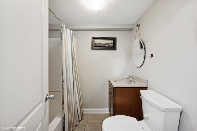 4218 N California Ave, Chicago, IL 60618 - bathroom with toilet, vanity, tile patterned flooring, shower / tub combo, and baseboards