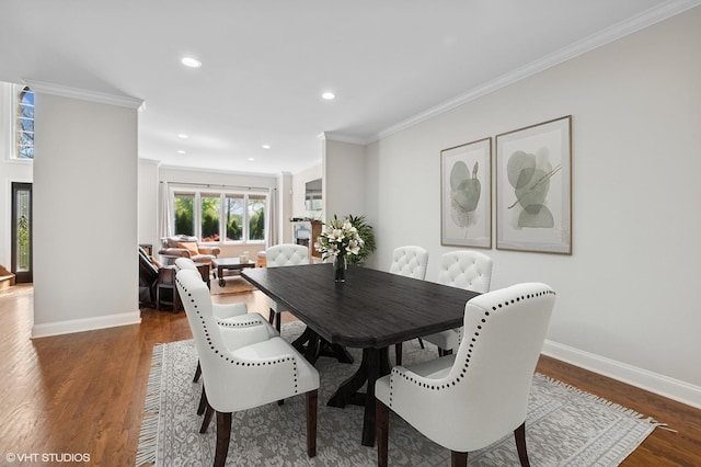 4218 N California Ave, Chicago, IL 60618 - dining space with baseboards, crown molding, wood finished floors, and recessed lighting