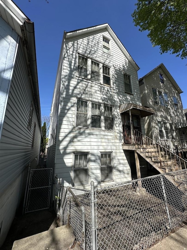 4636 S Wolcott Ave, Chicago, IL 60609 - view of side of property featuring a gate