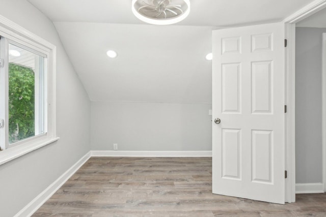 8428 S Rhodes Ave, Chicago, IL 60619 - bonus room with lofted ceiling, healthy amount of natural light, baseboards, wood finished floors, and recessed lighting