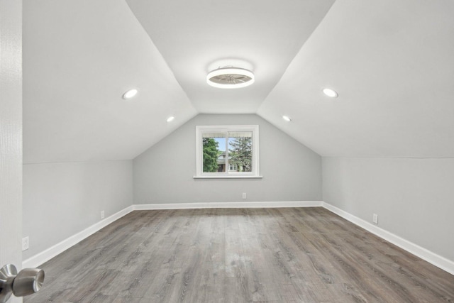 8428 S Rhodes Ave, Chicago, IL 60619 - bonus room with baseboards, wood finished floors, lofted ceiling, and recessed lighting
