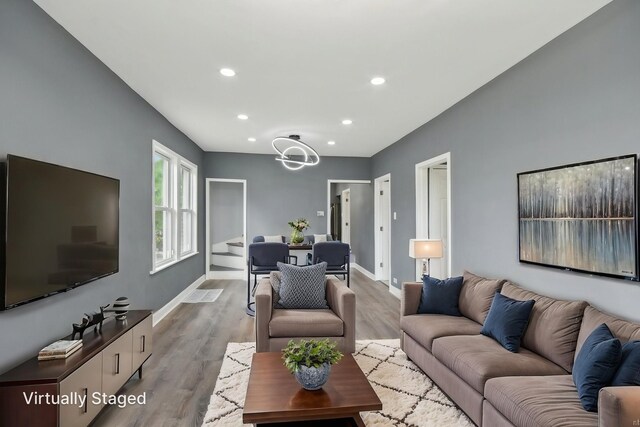 8428 S Rhodes Ave, Chicago, IL 60619 - living room featuring recessed lighting, wood finished floors, and baseboards