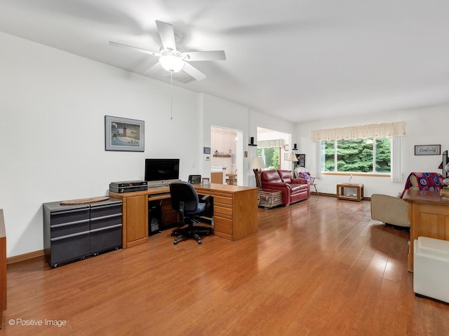 21142 W Braxton Ln Unit 21142, Plainfield, IL 60544 - office area featuring light wood-style flooring and ceiling fan