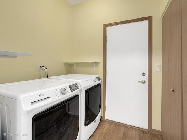21142 W Braxton Ln Unit 21142, Plainfield, IL 60544 - laundry room featuring separate washer and dryer and light wood-style floors