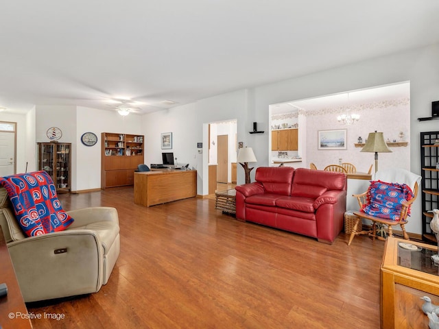 21142 W Braxton Ln Unit 21142, Plainfield, IL 60544 - living room with wood finished floors, ceiling fan, and a chandelier