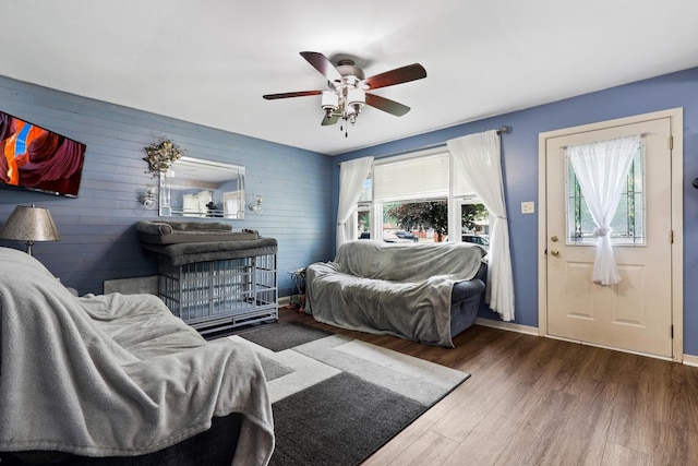14453 Kolin Ave, Midlothian, IL 60445 - living room with wood finished floors, ceiling fan, and baseboards
