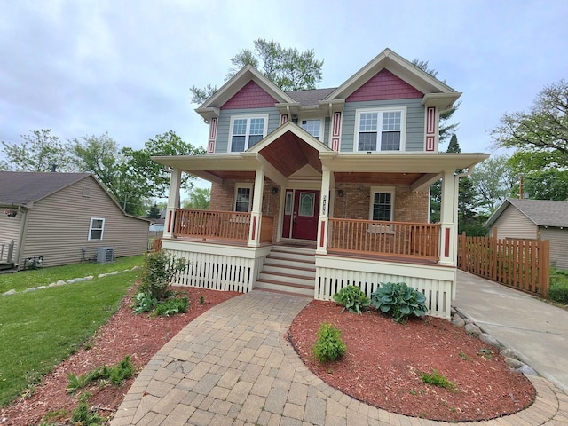 5115 E Ln, Mchenry, IL 60050 - view of front of property featuring a porch, brick siding, a front yard, and central AC