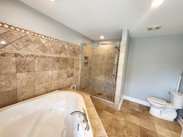 5115 E Ln, Mchenry, IL 60050 - full bath with a tub with jets, toilet, a stall shower, baseboards, and recessed lighting