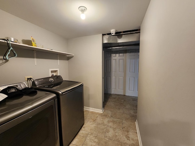 5115 E Ln, Mchenry, IL 60050 - washroom with baseboards and washing machine and dryer