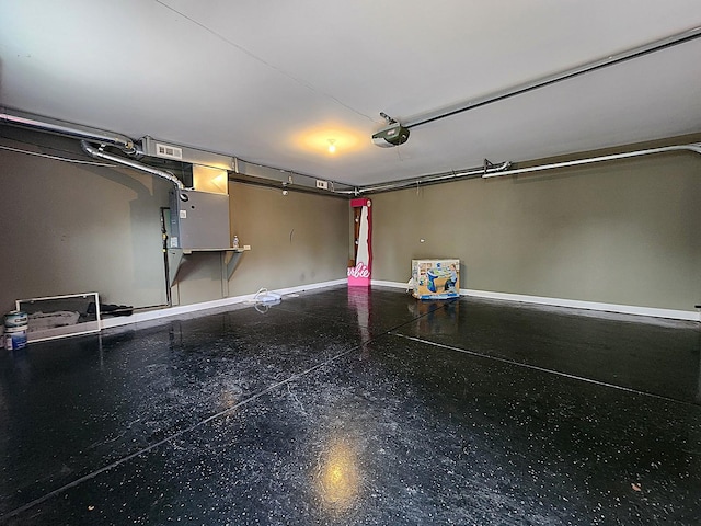 5115 E Ln, Mchenry, IL 60050 - garage featuring a garage door opener and baseboards