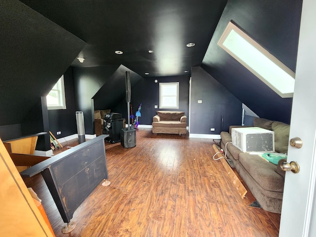 5115 E Ln, Mchenry, IL 60050 - cinema with wood finished floors, a skylight, baseboards, and lofted ceiling